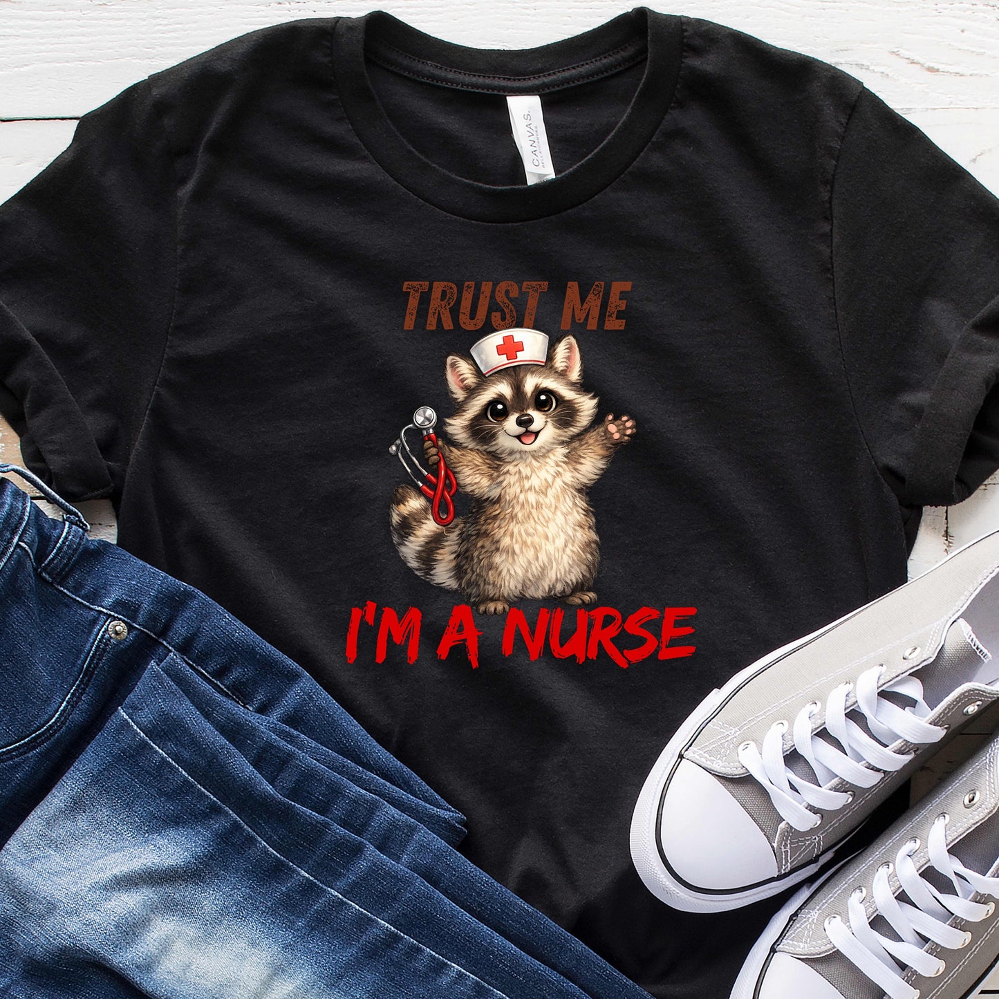 RACOON TRUST ME IM A NURSE. T-Shirt